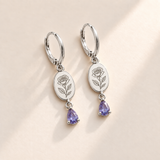 Custom Birth Flower & Birthstone Drop Earrings june silver hero photo - engraved rose with layered petals and three leaves with pale lavender violet pear stones Anthology Jewelry