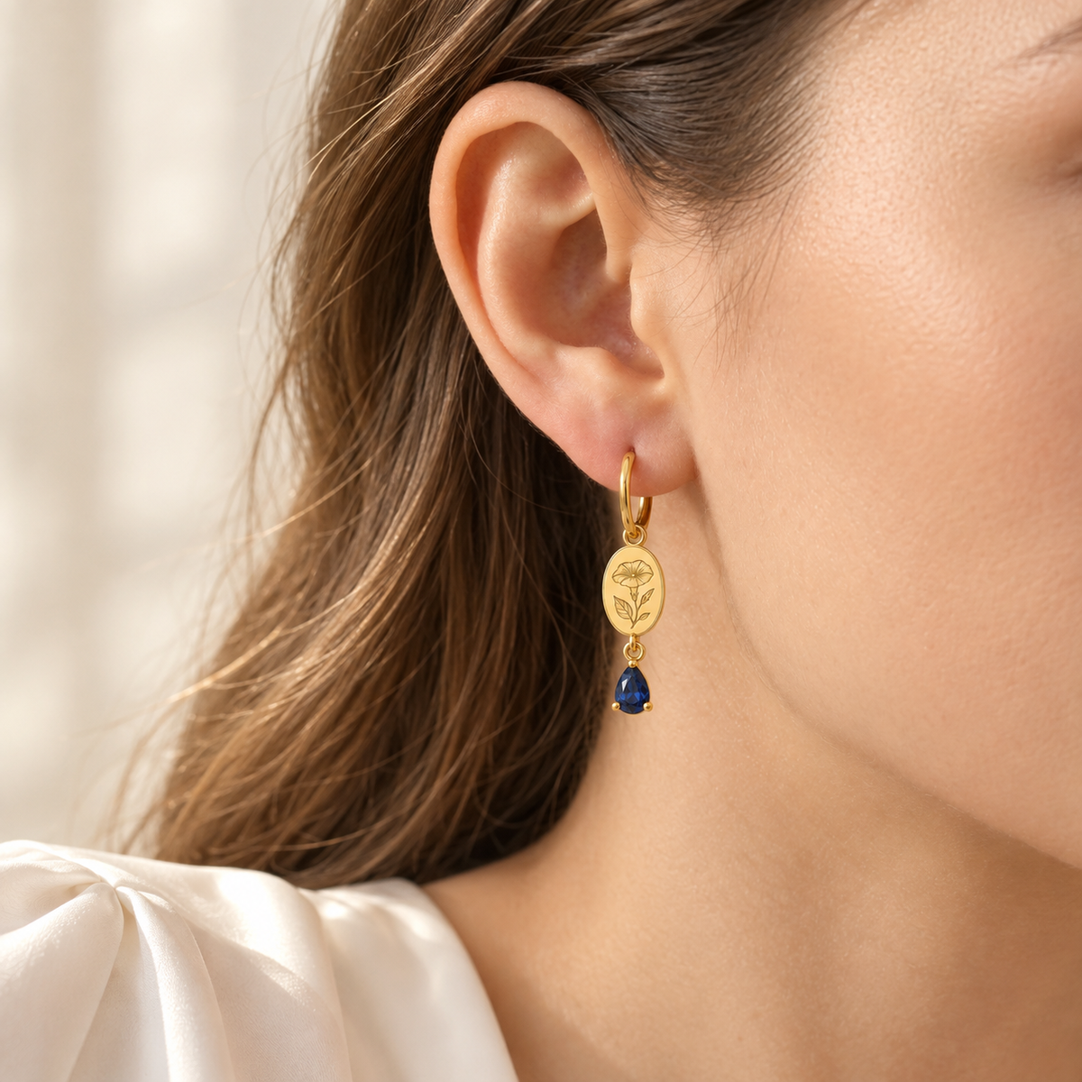 Custom Birth Flower & Birthstone Drop Earrings lifestyle photo - woman wearing gold floral drop earring Anthology Jewelry