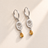 Custom Birth Flower & Birthstone Drop Earrings november silver hero photo - engraved chrysanthemum with elongated curled petals and serrated leaves with golden yellow citrine pear stones Anthology Jewelry