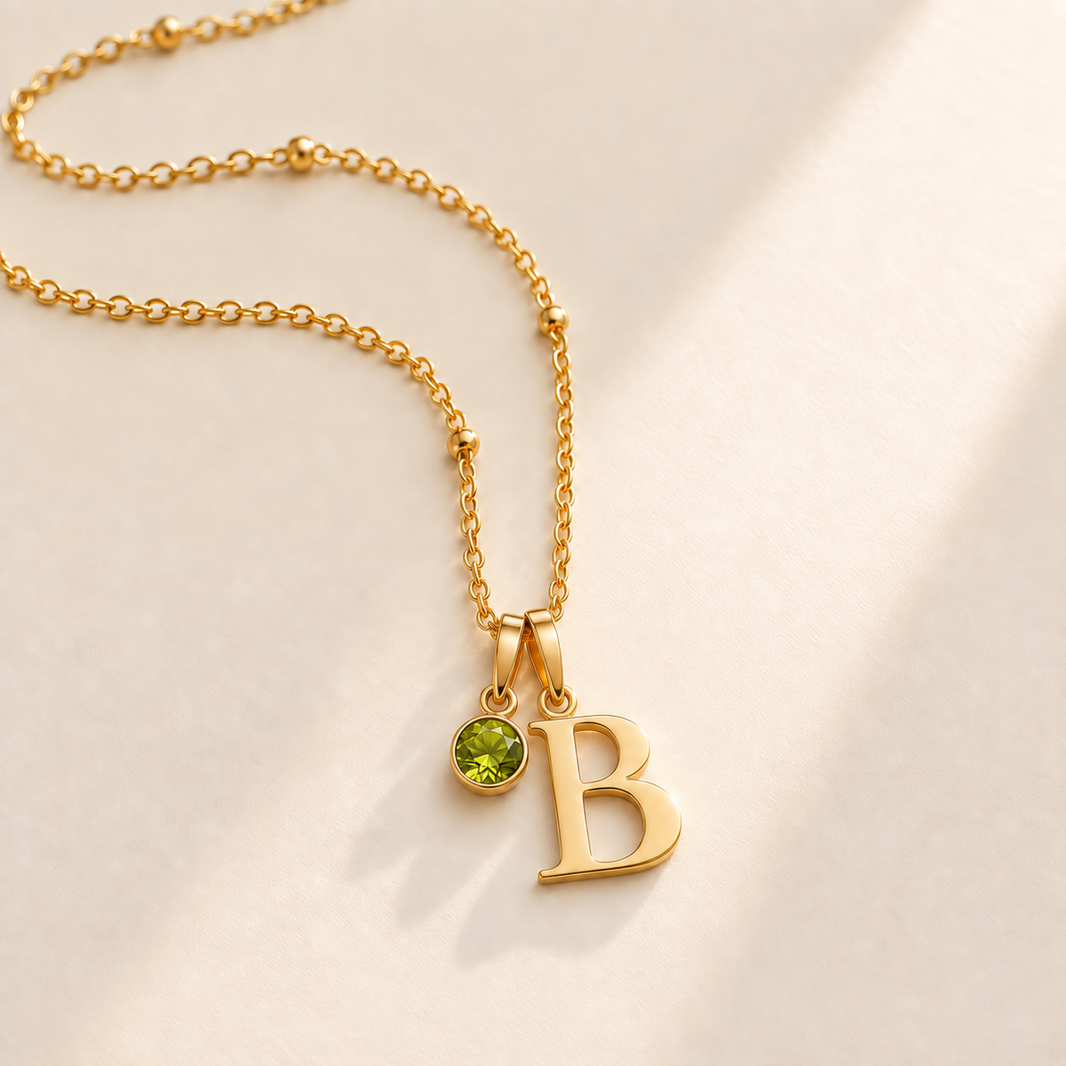 Custom Birthstone Initial Necklace stone august photo - two separate bails with serif initial B and round birthstone Anthology Jewelry