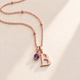 Custom Birthstone Initial Necklace rose gold February birthstone photo - serif initial B with round purple stone Anthology Jewelry