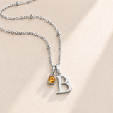 Custom Birthstone Initial Necklace november silver birthstone photo - serif initial B with round birthstone Anthology Jewelry