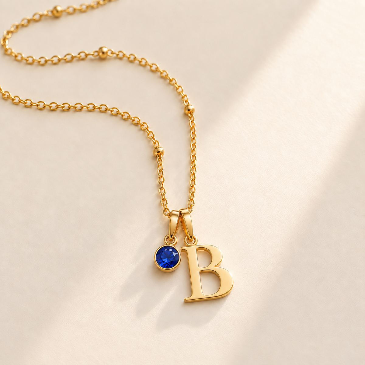Custom Birthstone Initial Necklace stone september photo - two separate bails with serif initial B and round birthstone Anthology Jewelry