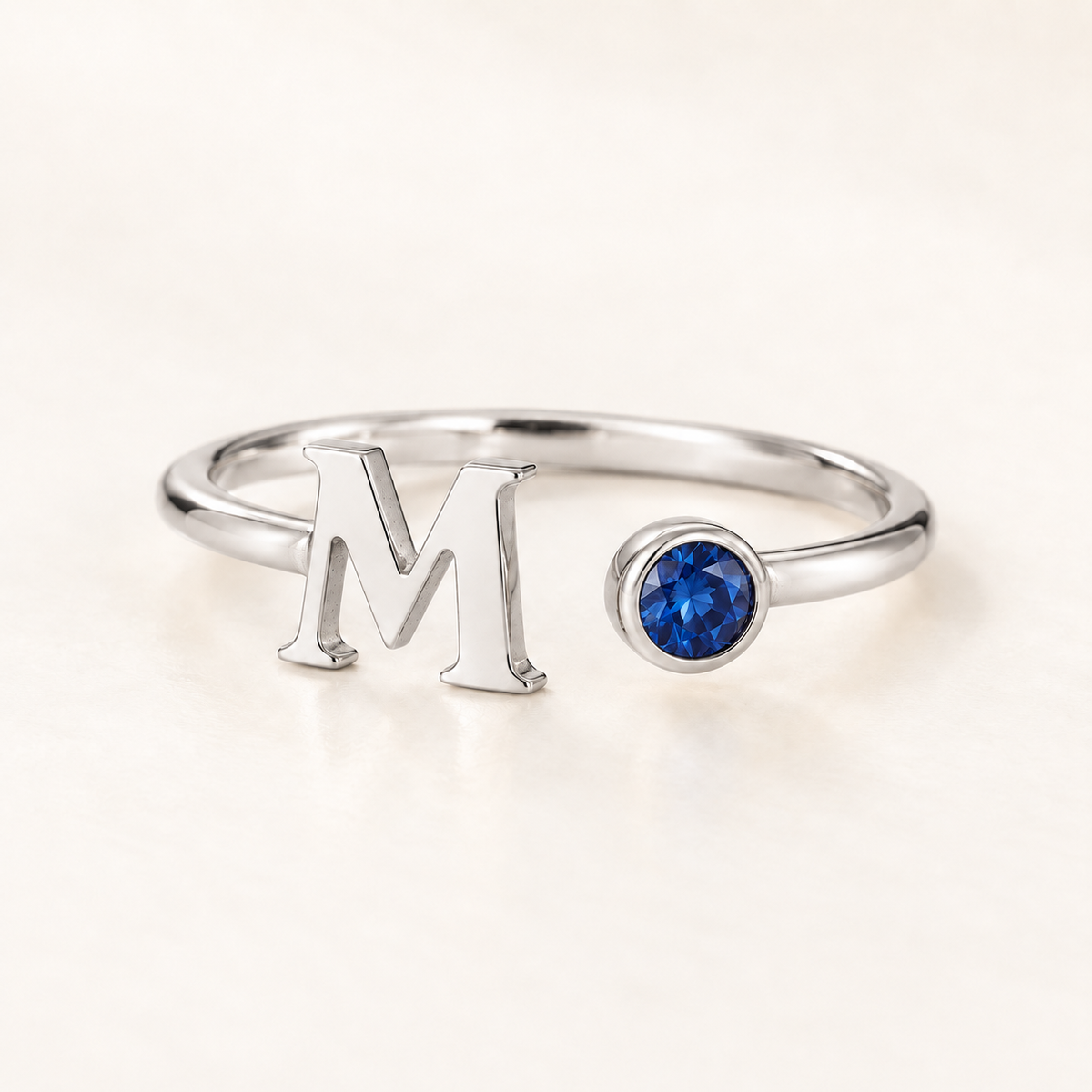 Custom open birthstone initial ring — hero silver