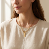 Custom Carabiner Charm Necklace lifestyle photo - woman wearing gold paperclip chain necklace with carabiner charm Anthology Jewelry