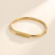 Custom Classic Hinge Bangle hero photo - gold bangle engraved EVERLY Anthology Jewelry
