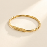 Custom Classic Hinge Bangle hero photo - gold bangle engraved EVERLY Anthology Jewelry