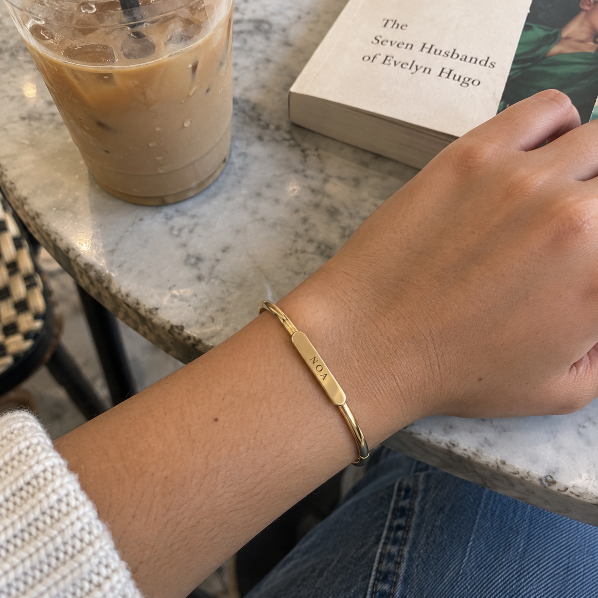 Custom Classic Hinge Bangle UGC photo - gold NOA bangle at cafe Anthology Jewelry