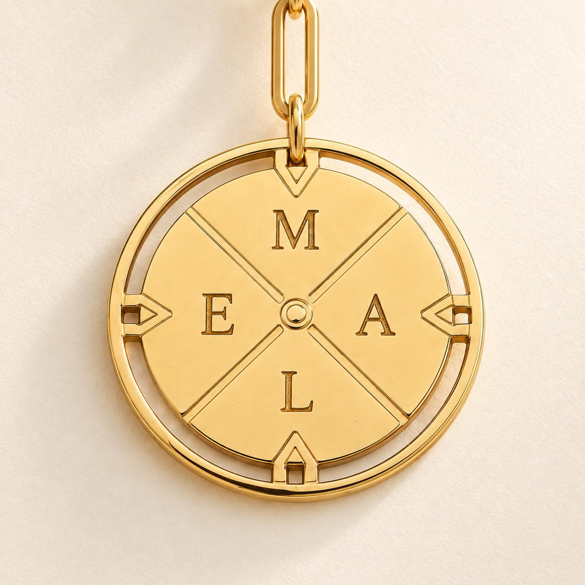 Custom Compass Initial Necklace close-up of gold compass initials and open circular frame Anthology Jewelry