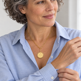 Custom Compass Initial Necklace woman wearing gold compass initial necklace Anthology Jewelry