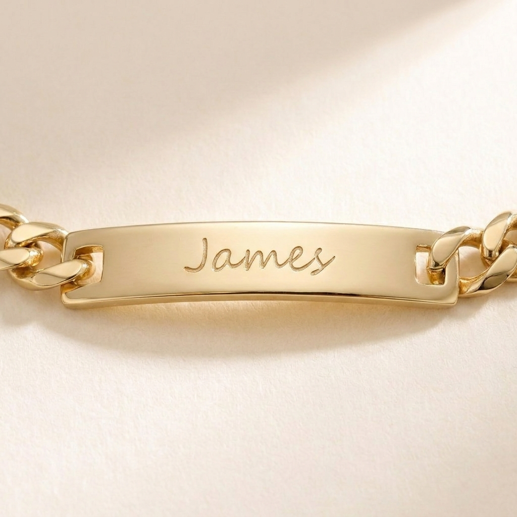 Custom Curb Chain ID Bracelet close up detail photo - engraved ID plate and curb links metal quality Anthology Jewelry