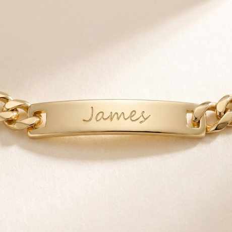 Custom Curb Chain ID Bracelet close up detail photo - engraved ID plate and curb links metal quality Anthology Jewelry