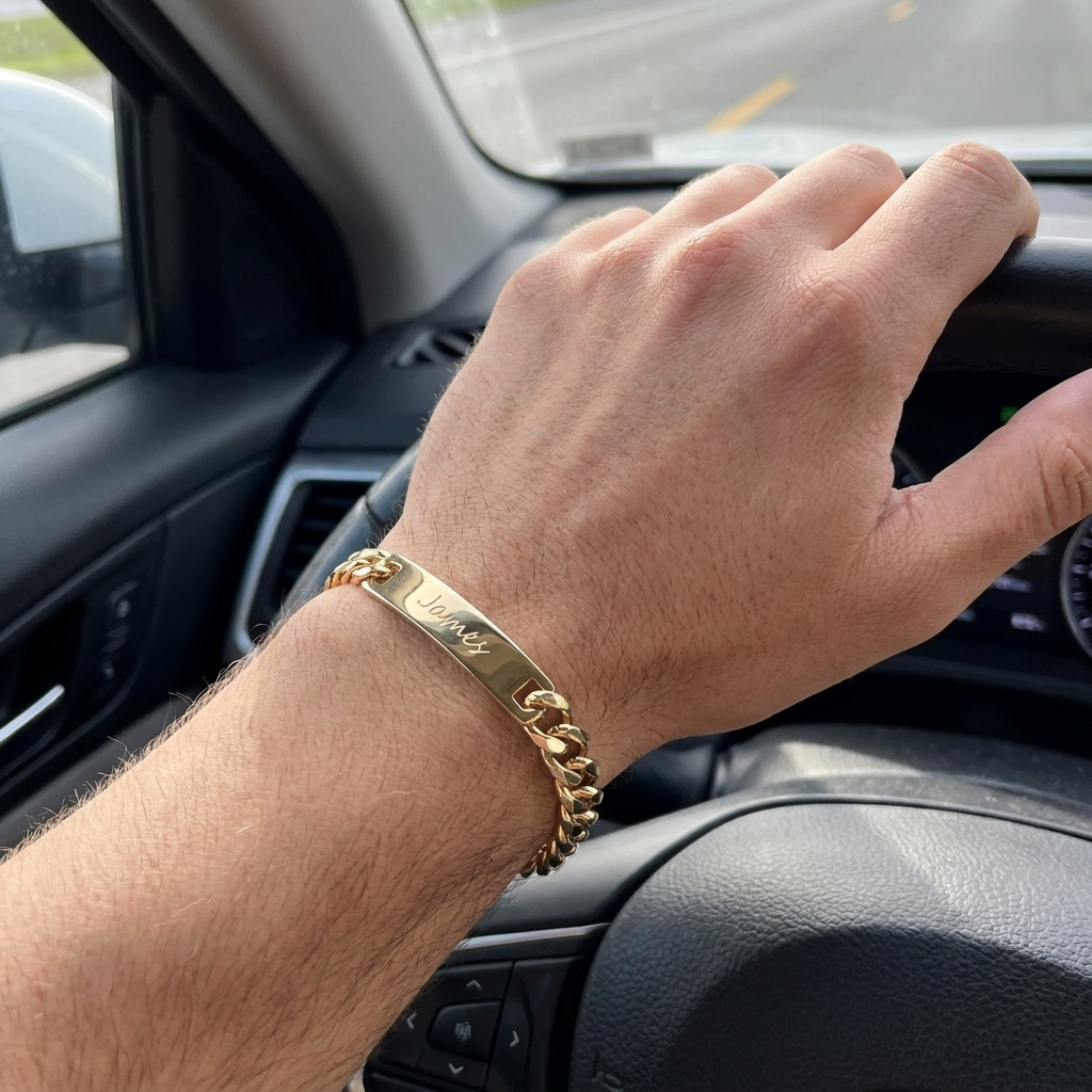 Custom Curb Chain ID Bracelet UGC photo - engraved gold curb chain bracelet worn while driving Anthology Jewelry