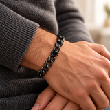 Custom Curb Link Photo Bracelet lifestyle photo - Black photo bracelet worn with charcoal knitwear, with open oval curb links and dark projection lens - Anthology Jewelry