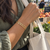 Custom Cut Out Cuff customer-style photo - gold openwork cuff at farmers market Anthology Jewelry