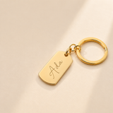 Custom Dog Tag Keychain in gold with handwritten initials - front hero