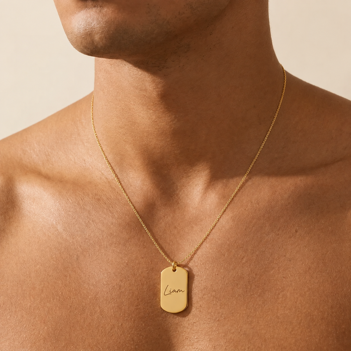 Custom Dog Tag Necklace worn lifestyle photo - personalized gold dog tag necklace for men Anthology Jewelry