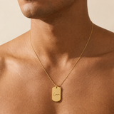 Custom Dog Tag Necklace worn lifestyle photo - personalized gold dog tag necklace for men Anthology Jewelry