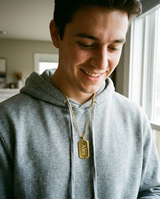 Custom Dog Tag Necklace UGC photo - customer wearing personalized gold dog tag necklace Anthology Jewelry