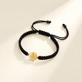 Custom Drawing Bracelet | Men's Black Braided Cord hero photo - original childlike sailboat engraved round disc on black braid Anthology Jewelry