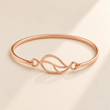 Custom Drawing Cuff Bracelet hero photo - rose gold open hand-drawn leaf, generated design concept Anthology Jewelry