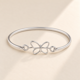 Custom Drawing Cuff Bracelet hero photo - silver open hand-drawn butterfly, generated design concept Anthology Jewelry