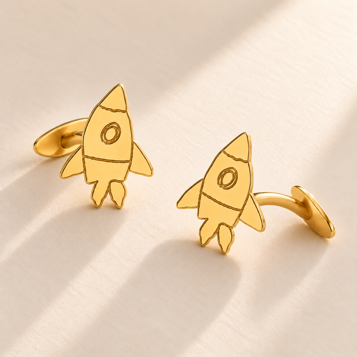 Custom Drawing Cufflinks hero photo - childlike rocket-shaped gold pair Anthology Jewelry