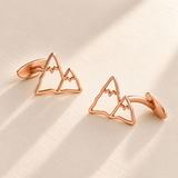 Custom Drawing Cufflinks hero photo - rose gold open hand-drawn mountain outline matching pair with fixed rear plates, generated design concept Anthology Jewelry