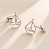 Custom Drawing Cufflinks hero photo - silver open hand-drawn sailboat matching pair with fixed rear plates, generated design concept Anthology Jewelry
