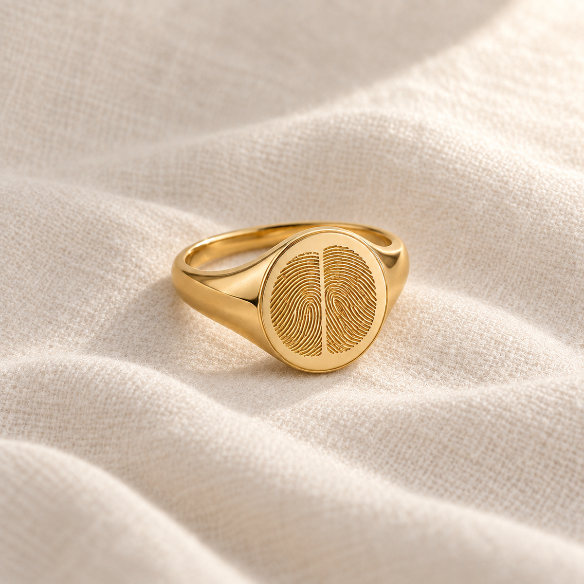 Custom Duo Fingerprint Signet Ring glamour photo - gold duo fingerprint signet ring on soft fabric Anthology Jewelry