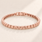 Custom Engraved Dot Bracelet hero photo - rose gold linked round beads with engraved letters Anthology Jewelry