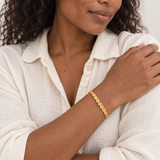 Custom Engraved Dot Bracelet second lifestyle photo - linked round bead bracelet with engraved letters worn on the wrist Anthology Jewelry