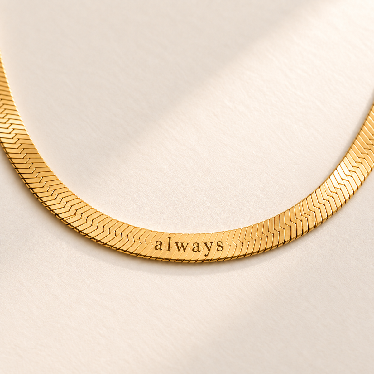 Custom Engraved Herringbone Necklace detail 1 photo - macro engraving directly on chain Anthology Jewelry