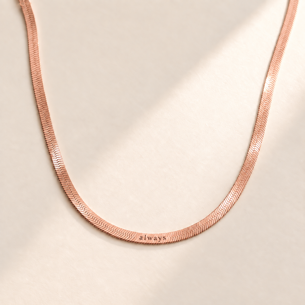 Custom Engraved Herringbone Necklace hero rose gold photo - rose gold finish of same hero composition Anthology Jewelry