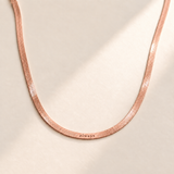 Custom Engraved Herringbone Necklace hero rose gold photo - rose gold finish of same hero composition Anthology Jewelry