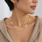 Custom Engraved Herringbone Necklace lifestyle 1 photo - woman wearing gold engraved herringbone chain Anthology Jewelry