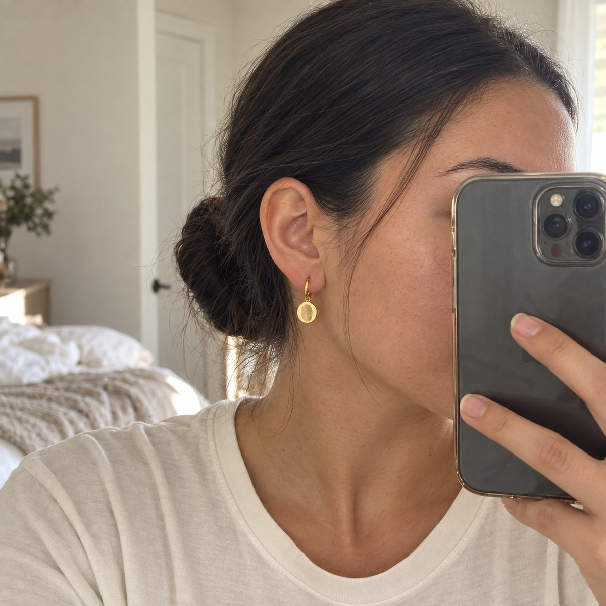 Custom Fingerprint Huggie Hoop Earrings UGC photo - mirror selfie wearing gold fingerprint earring Anthology Jewelry