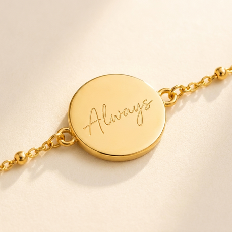 Custom Handwriting Bracelet Disc Pendant detail photo - close-up of handwriting engraved on gold disc Anthology Jewelry