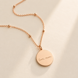Custom Handwriting Necklace Disc Pendant close up detail - engraved signature disc Anthology Jewelry