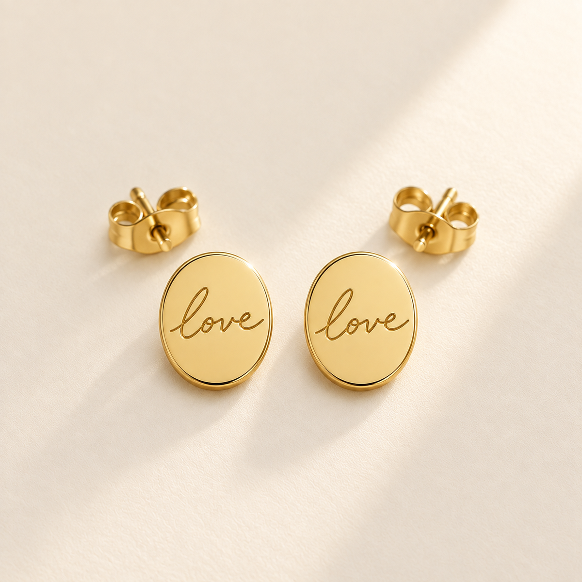 Custom Handwriting Oval Stud Earrings hero photo - gold oval handwritten studs Anthology Jewelry