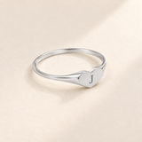 Custom Heart Signet Initial Ring hero photo - silver heart signet ring with an engraved initial Anthology Jewelry