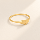 Custom Heart Signet Initial Ring hero photo - gold heart signet with engraved J Anthology Jewelry