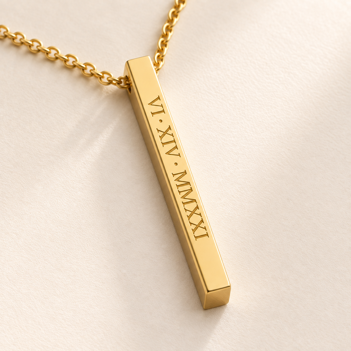 Close detail of the gold medium column necklace