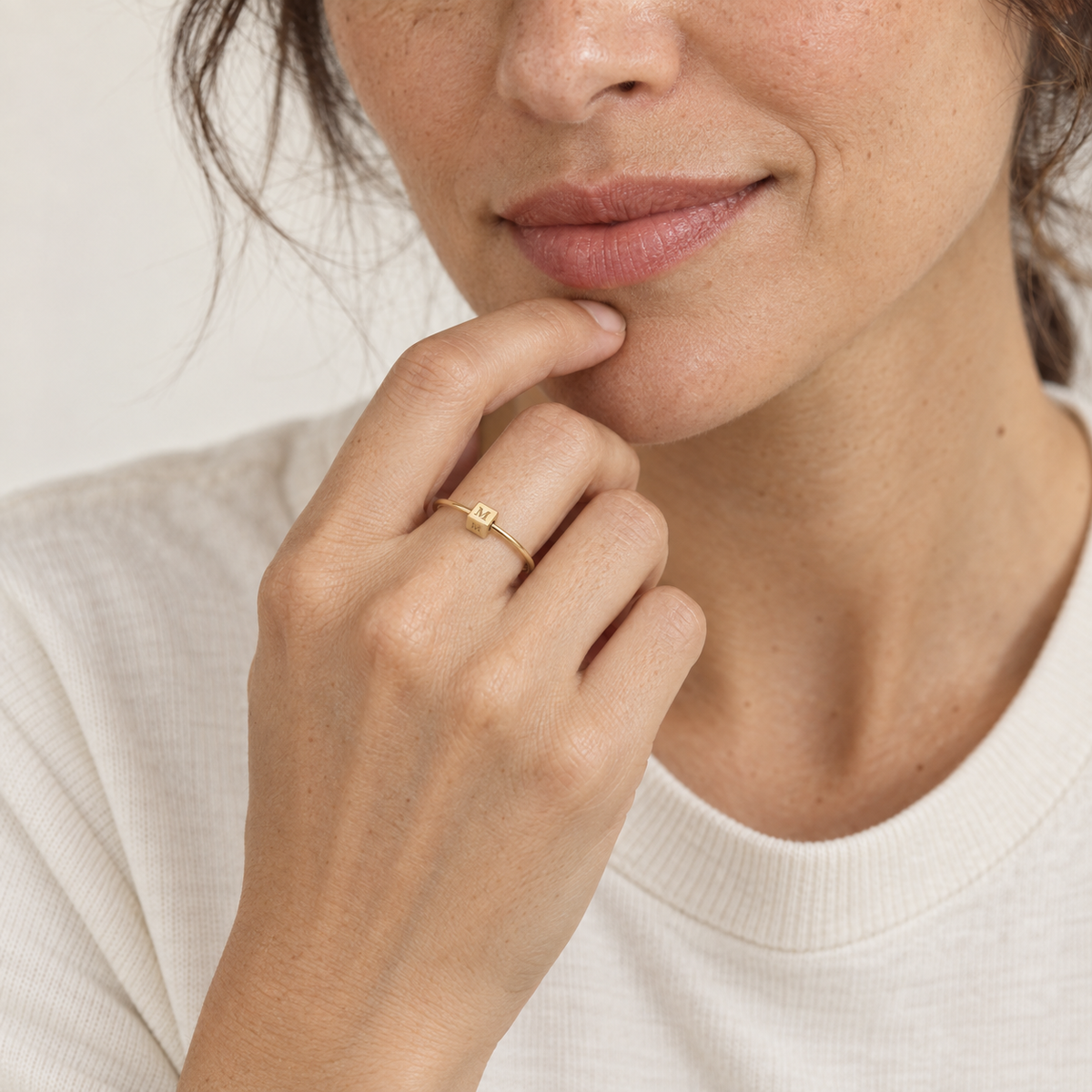 Woman wearing the gold Custom Mini Block Ring