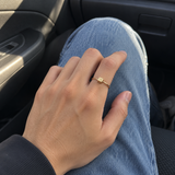 Customer-style phone photo of gold Mini Block Ring