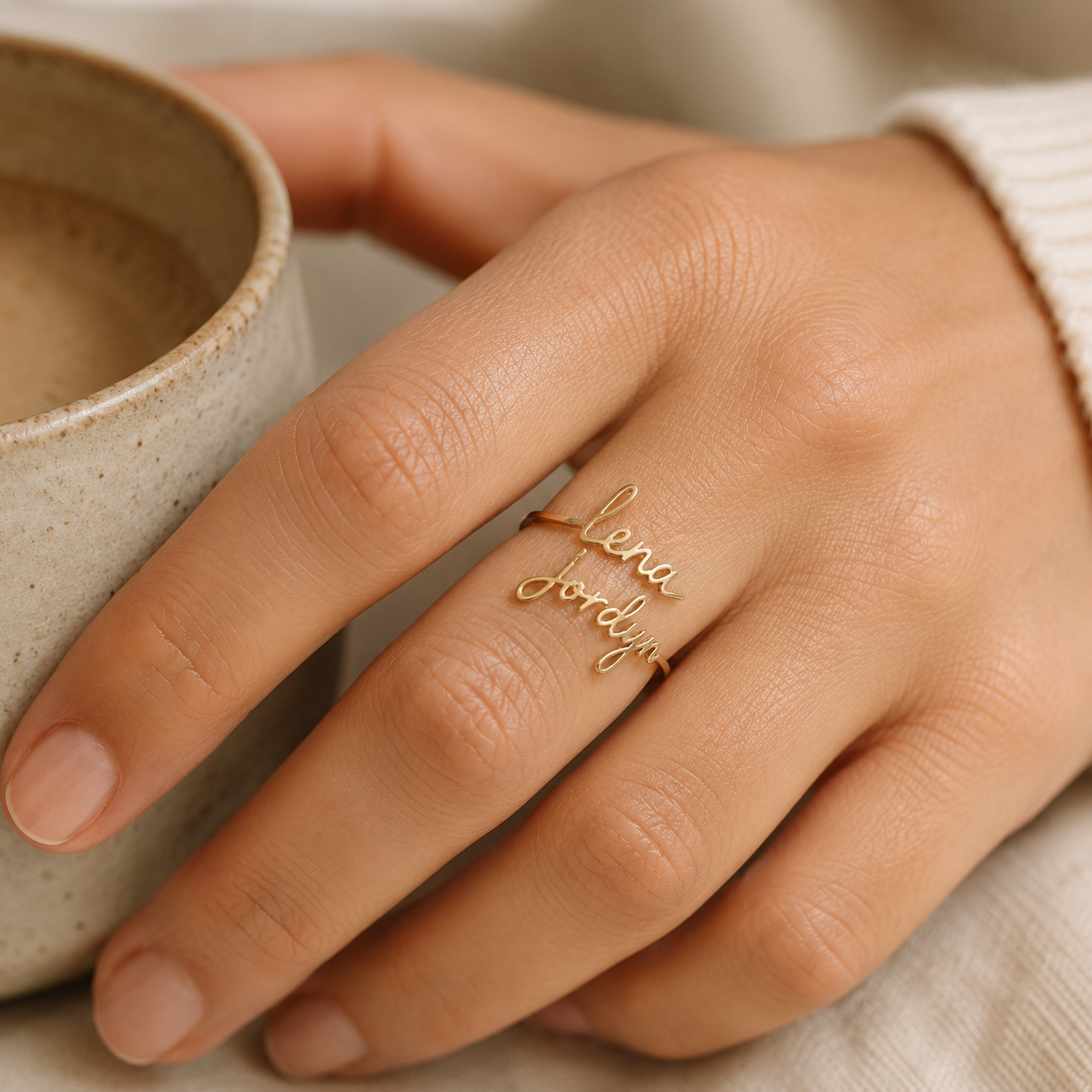 Personalized two name wrap ring lifestyle photo on hand - Anthology Jewelry