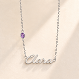 Custom Offset Birthstone Script Name Necklace february silver birthstone photo - Clara script with oval left-chain stone Anthology Jewelry