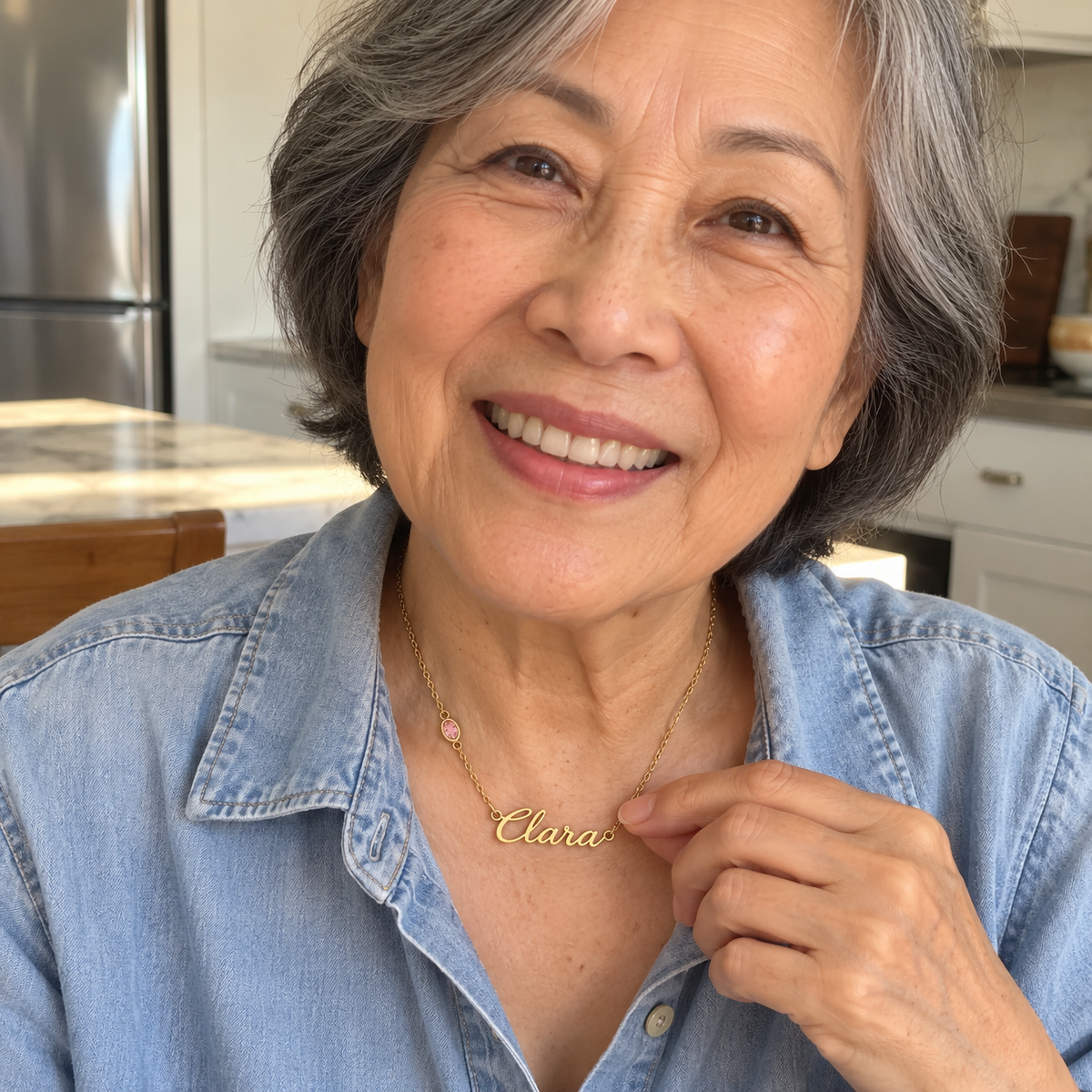 Casual kitchen photo showing script name birthstone necklace