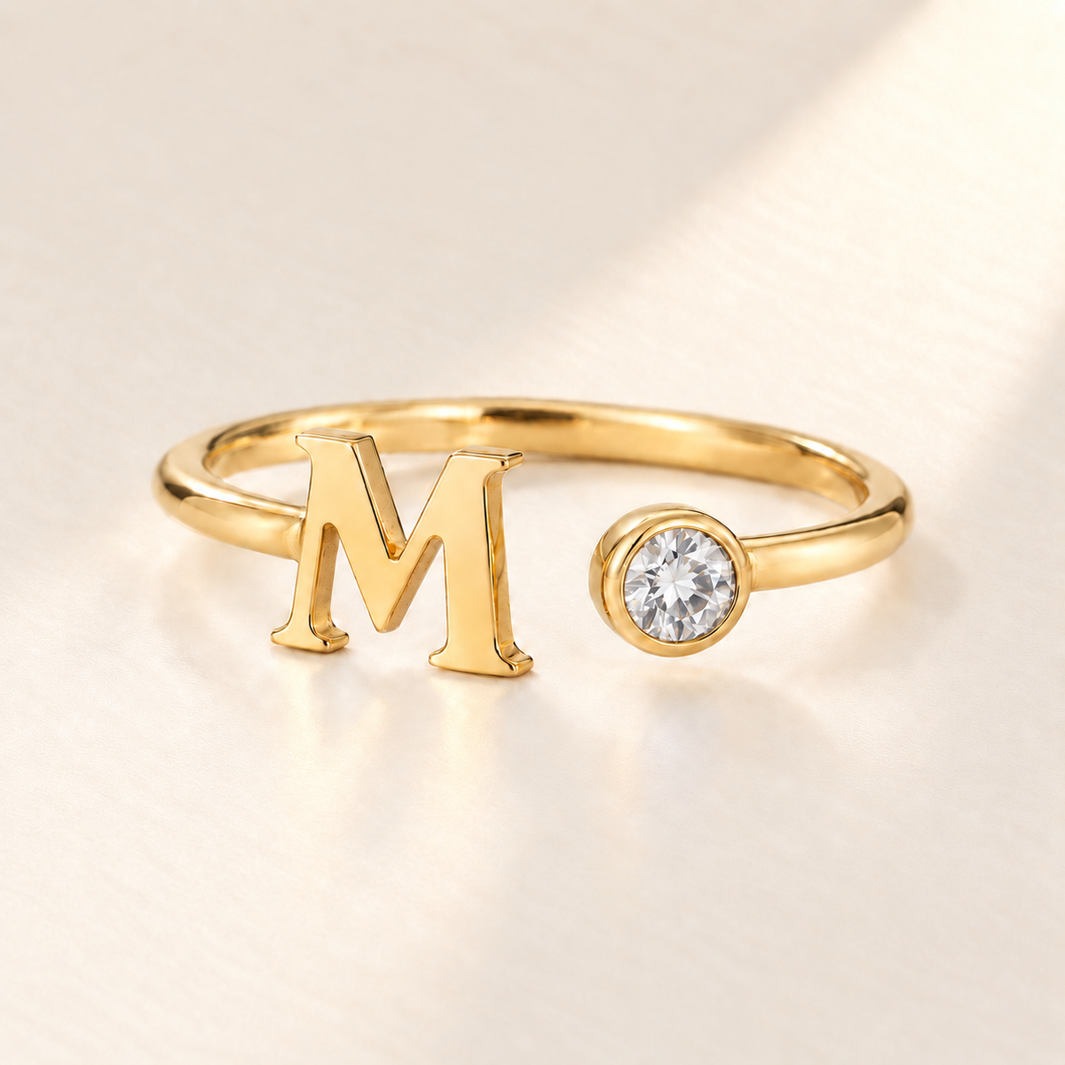Custom Open Birthstone Initial Ring, gold april birthstone variant image; ivory background