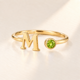 Custom Open Birthstone Initial Ring, gold august birthstone variant image; ivory background